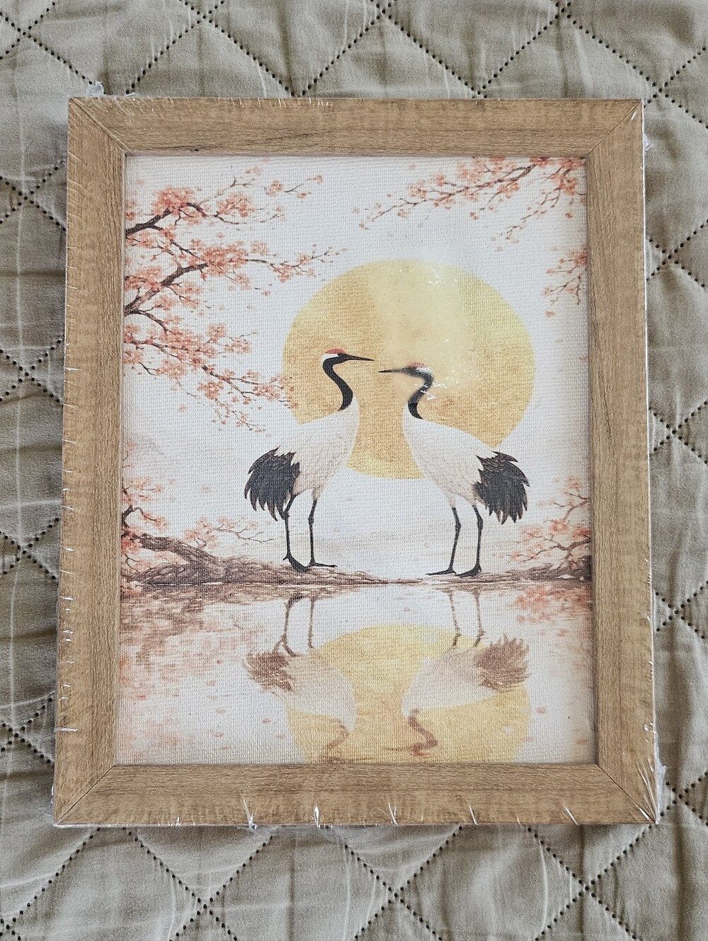 Japanese crane art print with two cranes standing under a cherry blossom tree